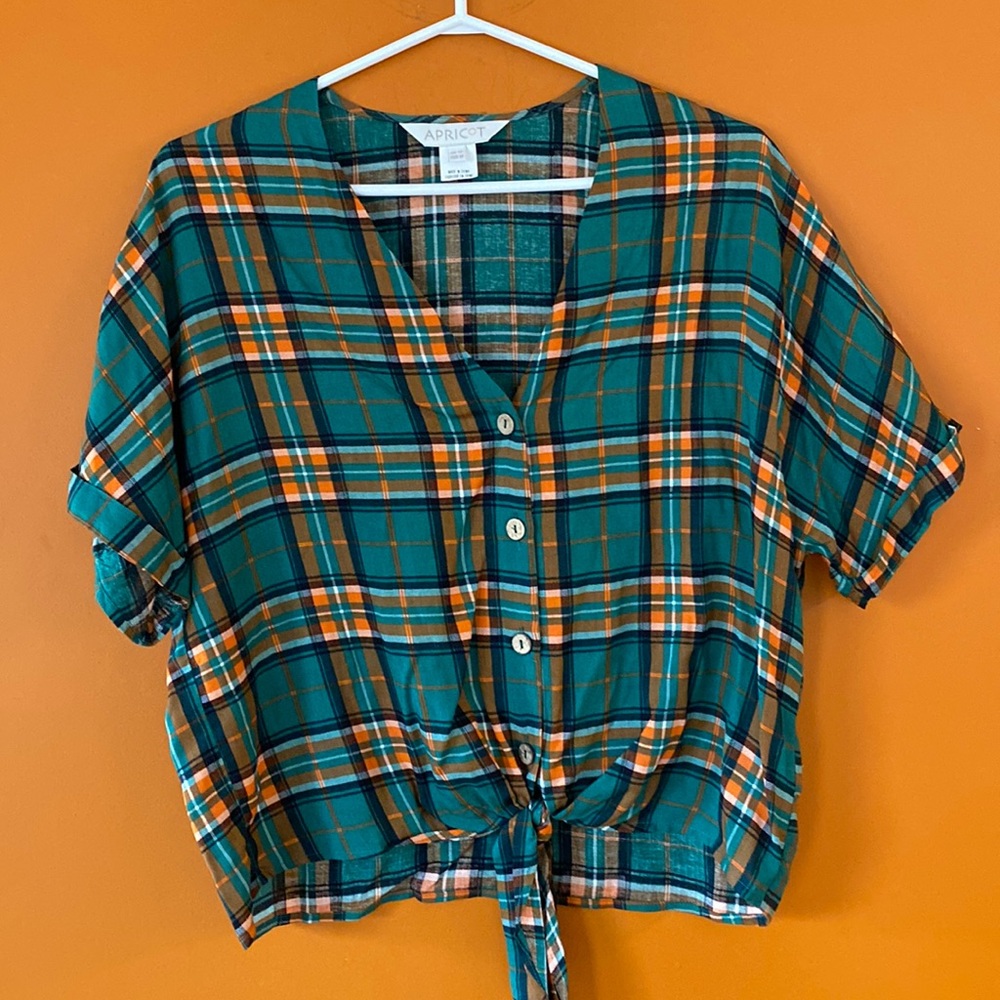 2/$20.  Apricot ladies plaid tie at the bottom shirt in size medium.